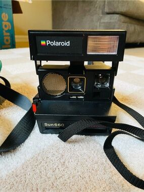 Polaroid Sun 660 Black Instant Camera with Rainbow Logo